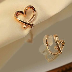 Brand new clipped on earrings (four pairs)